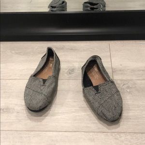 TOMS grey and black slip ons!